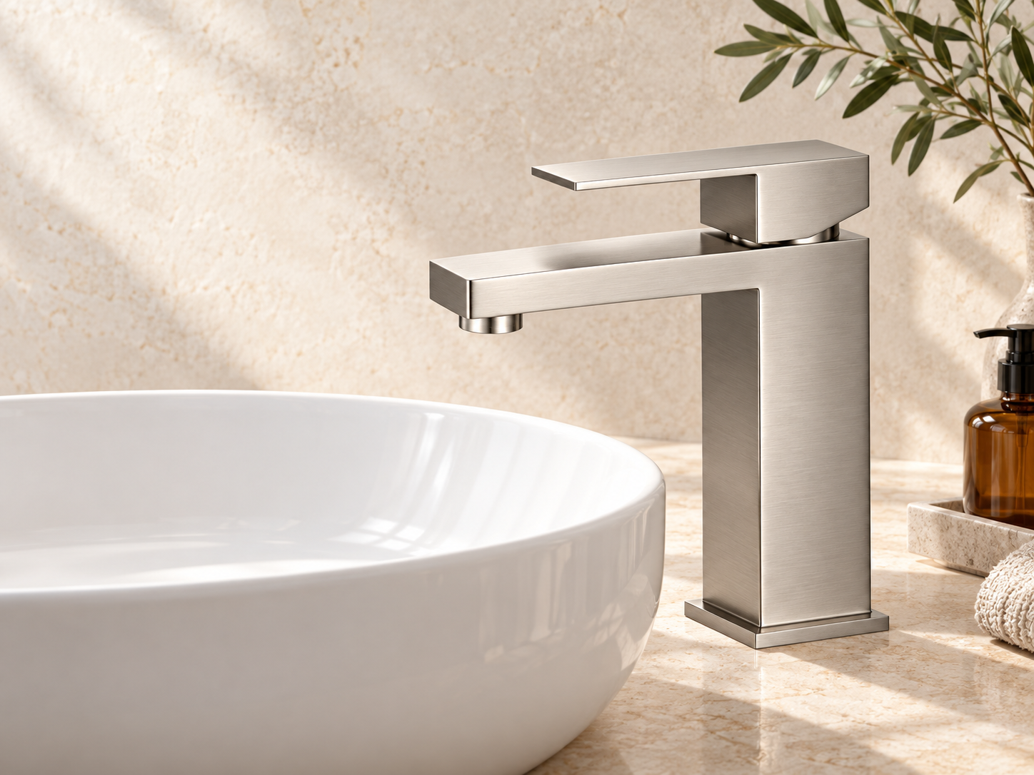 Moershu Faucet 2711 in brushed nickel beside a vessel basin